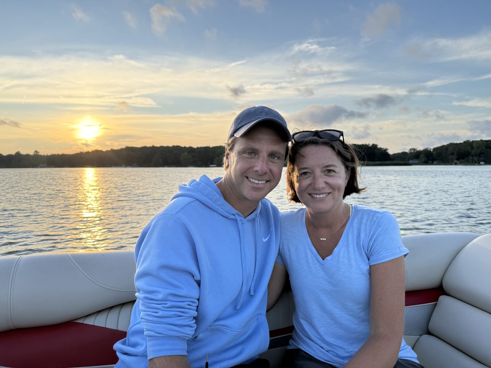 Justin and Lauren on the water at sunset